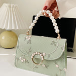 Bolsa feminina de corrente com pérolas e bordado floral - Elfmaeve