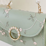 Bolsa feminina de corrente com pérolas e bordado floral - Elfmaeve